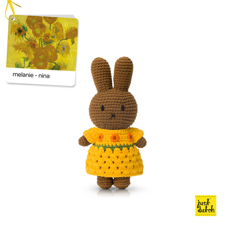 Melanie wearing sunflowers inspired dress. Front view