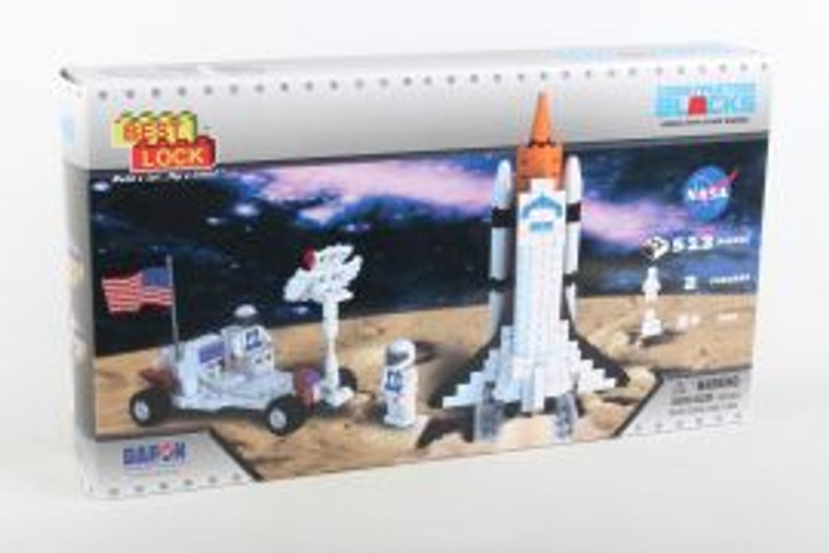 This image shows a box with the photo of a space shuttle that was built with the building blocks in this kit.