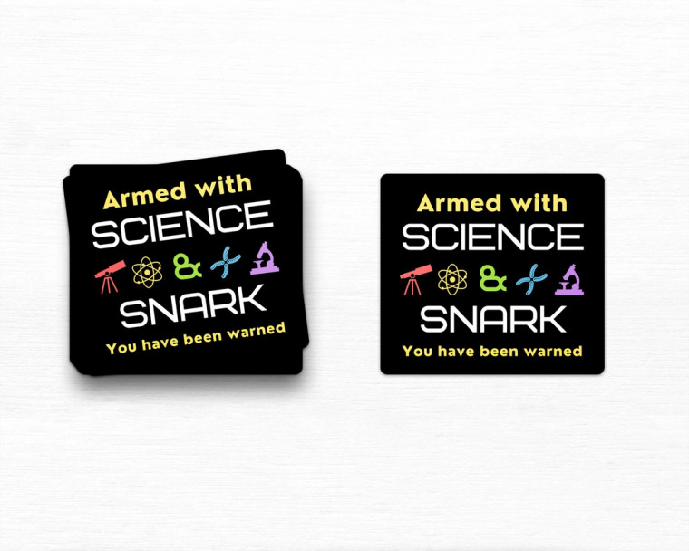 Two black vinyl stickers with the words "Armed with Science & Snark You have been warned" in black a nd yellow and multicolored illustrations of scientific symbols and tools