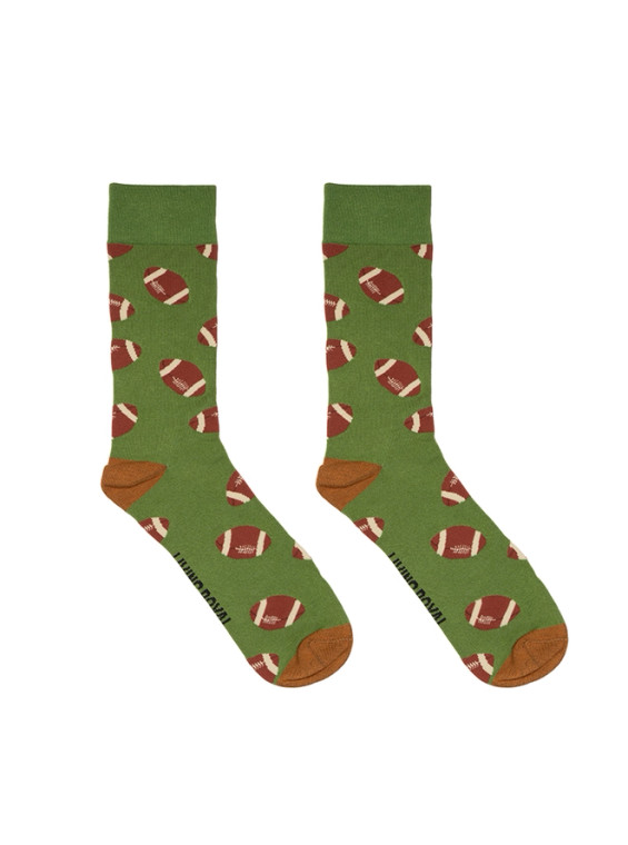 A pair of of green socks, brown heal and toe, footballs pattern