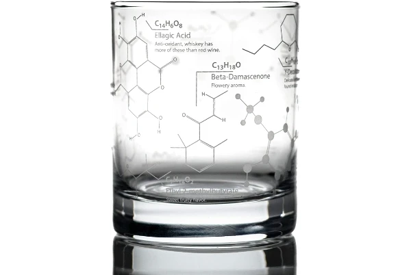 A whiskey glass etched with the models of molecules found in whiskey