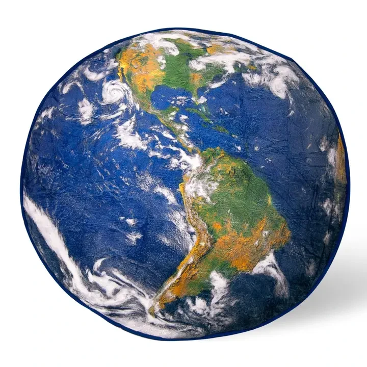 A circular blanket with a photo of the Western Hemisphere