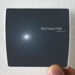 Antimatter-Lights-Out-Album-Cover-Sticker Antimatter-Lights-Out-Album-Cover-Sticker