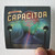 Cosmograf-Capacitor-Album-Cover-Sticker