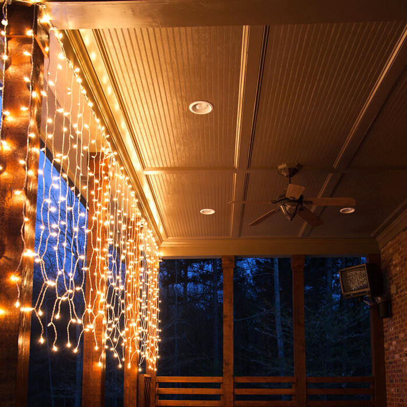 Curtain Lights Shimmer Across a Deck