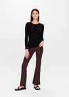 THE UPSIDE Peached Florence Flare in Dark Brown is a sustainable high-rise full length flare pant with a “V” shaped waistband detail and printed arrow logo at back waistband.