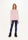 THE UPSIDE Alpine Chrissy Knit Top in Striped Red and White is a sustainable lightweight knit top with vertical stripe design, mini frill detail at cuff and intarsia heart and arrow at back.