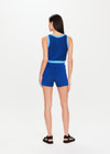 THE UPSIDE Nirvana Mahalia Top in Cobalt Blue is a sustainable organic cotton two tone ribbed knitted top with contrast top stitching detail and a cropped high neck shape.