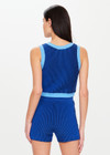 THE UPSIDE Nirvana Mahalia Top in Cobalt Blue is a sustainable organic cotton two tone ribbed knitted top with contrast top stitching detail and a cropped high neck shape.