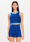THE UPSIDE Nirvana Mahalia Top in Cobalt Blue is a sustainable organic cotton two tone ribbed knitted top with contrast top stitching detail and a cropped high neck shape.