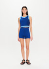 THE UPSIDE Nirvana Mahalia Top in Cobalt Blue is a sustainable organic cotton two tone ribbed knitted top with contrast top stitching detail and a cropped high neck shape.