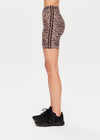 THE UPSIDE Ryker 6inch Spin Short in Leopard print is a sustainable mid-rise 6inch length spin short with contrast printed arrow at centre back and striped elastic down sides.