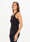 THE UPSIDE women's black Frankie Rib Tank is made from organic cotton elastane rib. This racer-back tank features a scooped hem at front and back and are designed for a regular fit.
