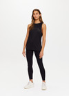 THE UPSIDE Black Quick Dry Sarah Tank is made from a recycled dri release fabrication in black and designed for a relaxed fit and features sweat wicking and quick drying properties.