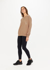 THE UPSIDE women’s brown Newport Crew, made with organic cotton french terry fabric, features a relaxed-fit, rib neck, cuffs and waist, and a tonal printed horseshoe logo on front.