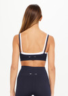 THE UPSIDE womens navy/white double layer Form Seamless Kelsey Bra made with Form Seamless fabric has mid coverage and support, and features moisture control properties.