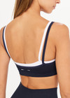 THE UPSIDE womens navy/white double layer Form Seamless Kelsey Bra made with Form Seamless fabric has mid coverage and support, and features moisture control properties.