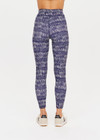 THE UPSIDE women’s indigo Yukimi 25 Inch Midi Pant made with Recycled Rib fabric features an abstract print and white printed arrow logo on back; perfect for yoga, pilates or barre.