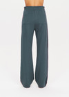 THE UPSIDE womens cool dark blue high waisted wide leg Niseko Monte Pant made with Lenzing viscose soft suiting fabric features elastic waistband, stripe down side seams and side and back pockets.