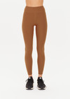 THE UPSIDE women's women's brown tobacco mid rise 25inch midi legging is made from recycled soft peach with moisture wicking, breathable and quick drying properties.