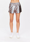 THE UPSIDE women's metallic Billie Run Short made with lightweight fabric features an elasticated waistband, side seam pockets and metallic gunmetal finish.