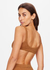 THE UPSIDE women's brown tobacco Sands Rory Bra is fully lined, made from a luxe cream textured fabrication with gold lurex threads and features straight back straps, scooped square neck, removable bust cups and bagged out edges for a soft, comfortable fit.
