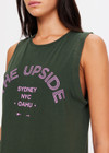 THE UPSIDE women's green Jetset Jeet Tank is made with organic cotton jersey, designed for a relaxed fit. This classic muscle tank features folded armhole details, perfect for leisure.