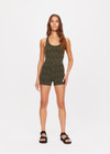 THE UPSIDE women's green Orchard Lia Onesie is made with textured jacquard fabric, designed for a firm fit. This onesie features a 3 inch leg and inner shelf bra, ideal for yoga.