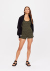 THE UPSIDE women's green Orchard Lia Onesie is made with textured jacquard fabric, designed for a firm fit. This onesie features a 3 inch leg and inner shelf bra, ideal for yoga.