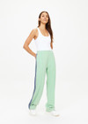 THE UPSIDE women's green Philosophy Jupiter Pant is made with soft lenzing fabric, for a regular fit. This mid-rise, wide leg pant features side pockets and an elastic waist.