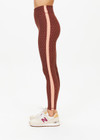 THE UPSIDE women's polka dot Maho 25 inch High Rise Midi Pant is made from a soft recycled ribbed fabric and features a soft folded waistband and contrast splice plan down the sides.