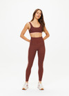 THE UPSIDE women's polka dot Maho 25 inch High Rise Midi Pant is made from a soft recycled ribbed fabric and features a soft folded waistband and contrast splice plan down the sides.