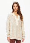 THE UPSIDE women's natural Alana Knitted Sweater is made with organic knit cotton, for an oversized fit. This knitted polo features a button front, and ribbed knit hem and cuffs.
