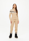 THE UPSIDE women’s khaki Fairbanks Blanche Half Zip is made from organic cotton. The high neck top features knitted fair isle pattern. Designed for Après-ski and winterwear.