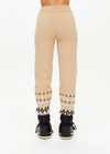 THE UPSIDE women’s khaki Fairbanks Jojo Knit Jogger is made from organic cotton. The cuffed pants features side pockets and soft knitted waistband. Designed for Après-ski and winterwear.