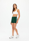 THE UPSIDE women's green Les Border Everit Knit Short is made from a viscose blend. The knitted mid-rise short features a knitted white side stripe for style and elasticated waistband for comfort. Designed for walking and recovery.