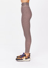 THE UPSIDE women's houndstooth check Bohemia 25 inch Midi Pant is made with recycled soft peached with a brushed handfeel, and moisture wicking, breathable and quick drying properties. This mid rise legging is designed for yoga, pilates and barre.