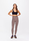 THE UPSIDE women's houndstooth check Bohemia 25 inch Midi Pant is made with recycled soft peached with a brushed handfeel, and moisture wicking, breathable and quick drying properties. This mid rise legging is designed for yoga, pilates and barre.