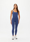 THE UPSIDE women's blue abstract print Farrow 25 inch High Midi Pant is made from a recycled jacquard rib fabric with breathable, quick drying and moisture wicking properties. This high waisted legging features a V-shaped front and is designed for yoga, pilates and barre.