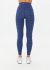 THE UPSIDE women's blue abstract print Farrow 25 inch High Midi Pant is made from a recycled jacquard rib fabric with breathable, quick drying and moisture wicking properties. This high waisted legging features a V-shaped front and is designed for yoga, pilates and barre.