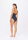 THE UPSIDE women's navy Caleta Lara Onepiece is made from specialty fabric with gold lurex and features a square neckline with scoop back, rouleau straps and is unlined.