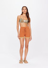 THE UPSIDE women's brown Vadella 4 inch Knit Spin Short is made from organic cotton. The knitted shorts are soft and supportive with an adjustable drawcord waist line. Designed for leisure and recovery.