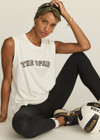 THE UPSIDE women's creme Estelle Tank is made from organic cotton. The relaxed muscle tank features a rib neckline and mesh embroidery. Designed to wear with your essentials.