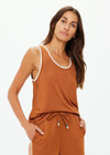 THE UPSIDE women's brown Zahara Jacquie Tank Top is made from a light slinky fabric. The tank is a retro basketball style tank with a contrast stripe on the neck and armholes. Designed for relaxed movement and leisure.