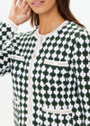THE UPSIDE women's green Portobello Crochet button down cardigan is made from hand crochet cotton. It features front patch pockets and white pearlised buttons.