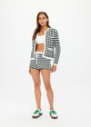 THE UPSIDE women's green Portobello Crochet button down cardigan is made from hand crochet cotton. It features front patch pockets and white pearlised buttons.