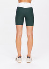 THE UPSIDE women's green Playoff 6inch Pocket Spin Short is made from a recycled soft peached fabrication with a brushed handfeel for a breathable and quick drying effect. The active shorts are paired with colours of navy and white and featuring side pockets for practicality. Designed for golf.