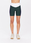 THE UPSIDE women's green Playoff 6inch Pocket Spin Short is made from a recycled soft peached fabrication with a brushed handfeel for a breathable and quick drying effect. The active shorts are paired with colours of navy and white and featuring side pockets for practicality. Designed for golf.