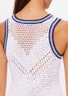 THE UPSIDE women's white Elsa Crochet Mini Dress is hand crocheted in organic cotton. The mini dress features a scoop neck and high back with sky blue detailing framed in navy. Designed for leisure and recovery.