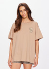 THE UPSIDE women's brown Sammi Tee is made from organic cotton. This oversized t-shirt features a soft rib neckline. Designed for leisure and recovery.